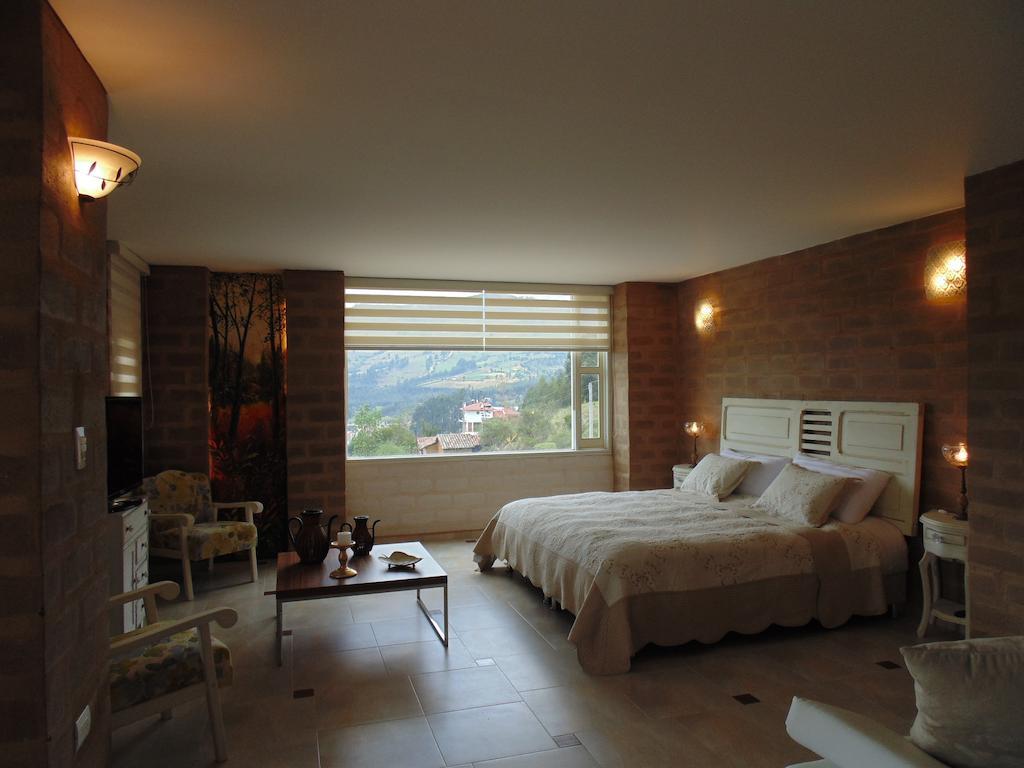 Bella Tierra Hotel Boutique Tibasosa Room photo